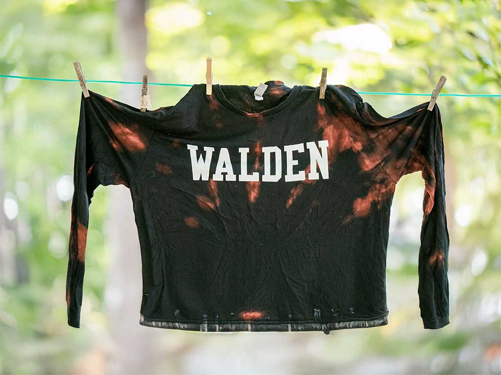 Tie-dye shirt hanging from a clothesline 